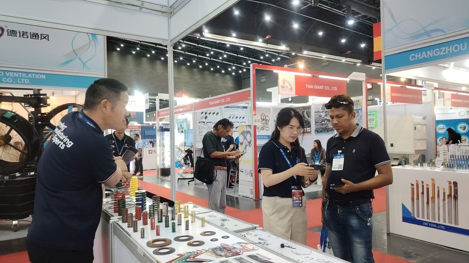 NorenSpring representative presenting products at Manufacturing Expo