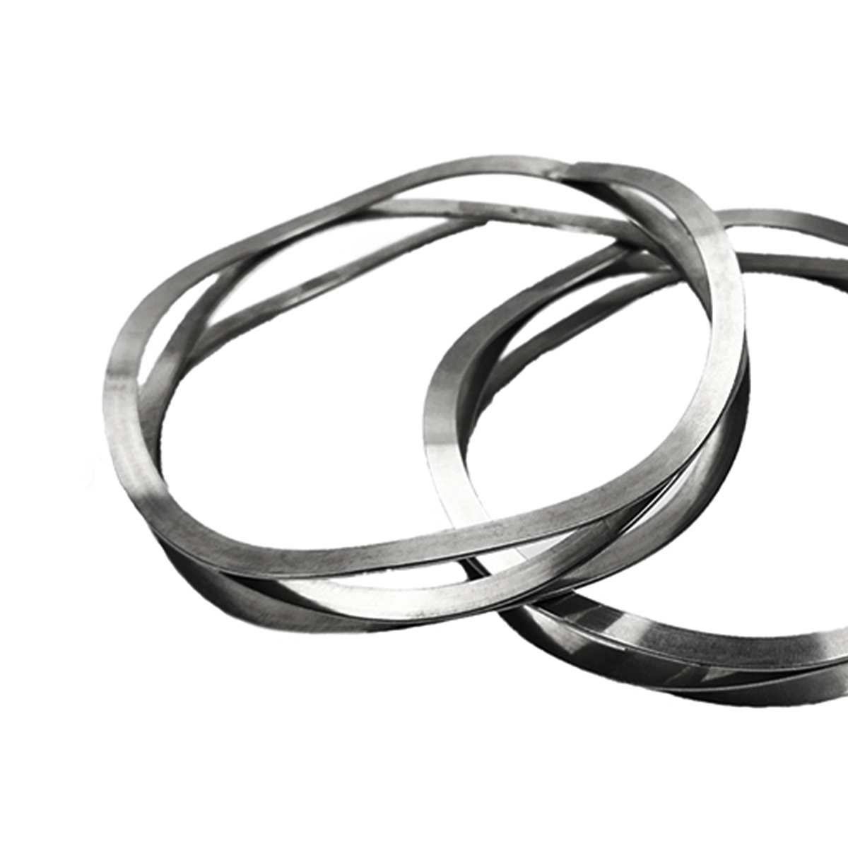 Two steel wave springs, close-up of the flat wire waves
