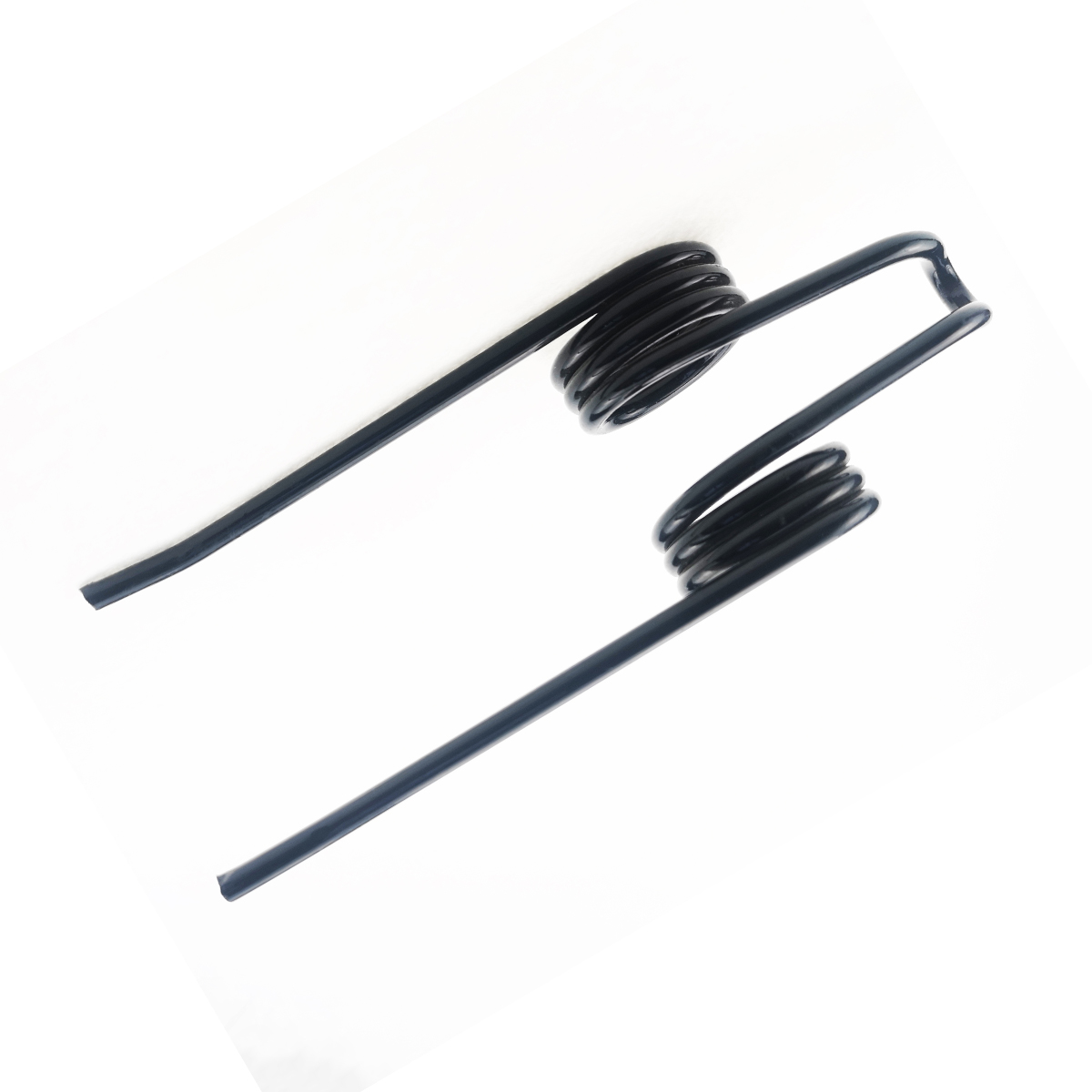 Pair of black torsion springs with long legs, laid diagonally