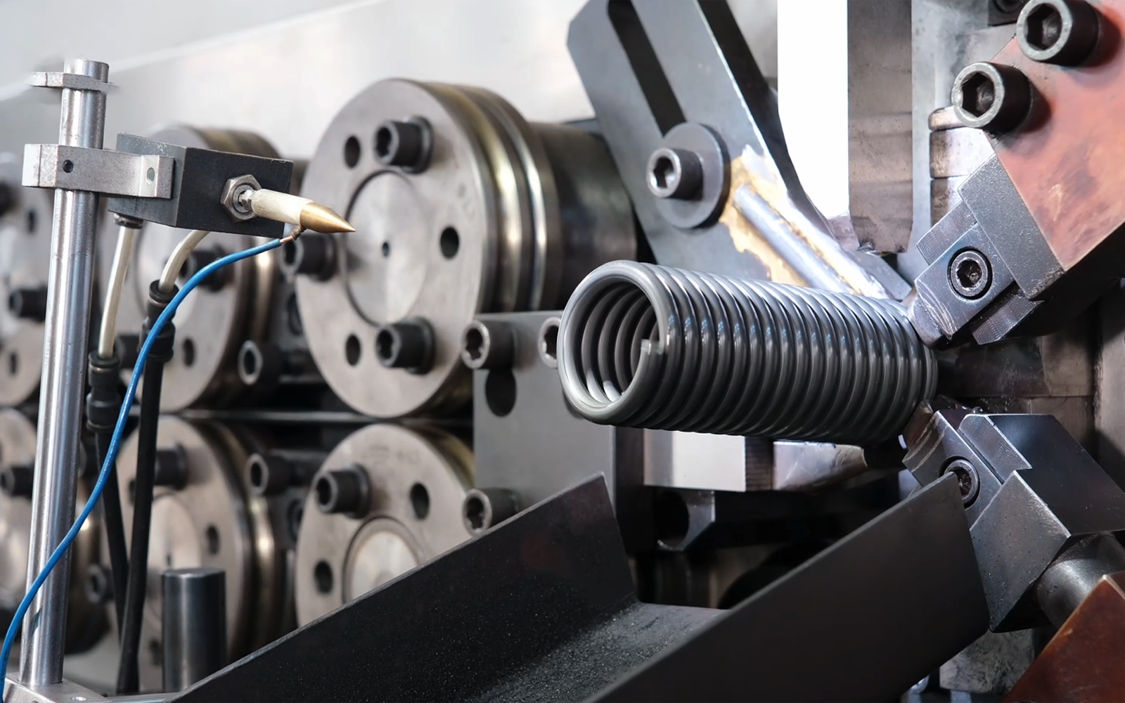 CNC spring coiling equipment producing consistent compression springs