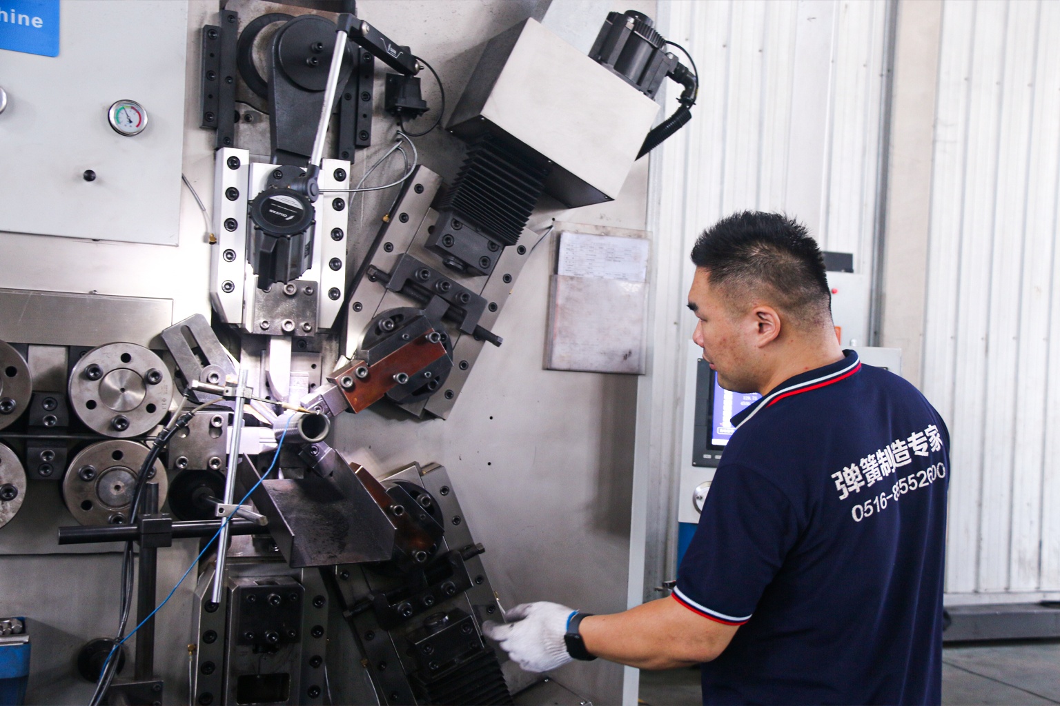 Controlled spring manufacturing equipment on the NorenSpring production floor